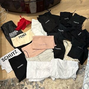 Lots of designer shoe bags!!!chanel Stuart W, jimmy choo, Stella Mc C, schutz